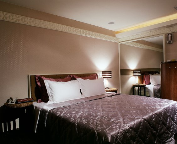 Imagen de la habitación del Hotel Tai Lee. Foto 6