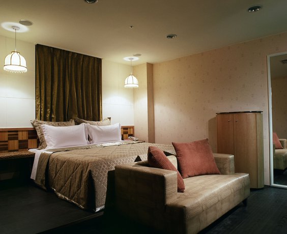 Imagen de la habitación del Hotel Tai Lee. Foto 8