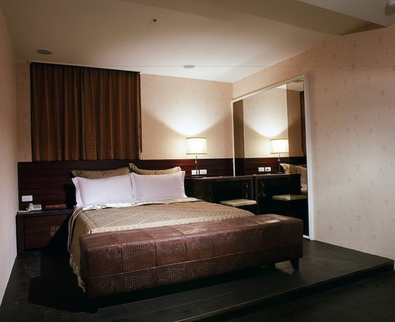 Imagen de la habitación del Hotel Tai Lee. Foto 10