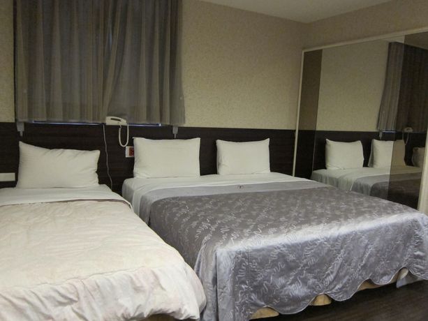 Imagen de la habitación del Hotel Tai Lee. Foto 11