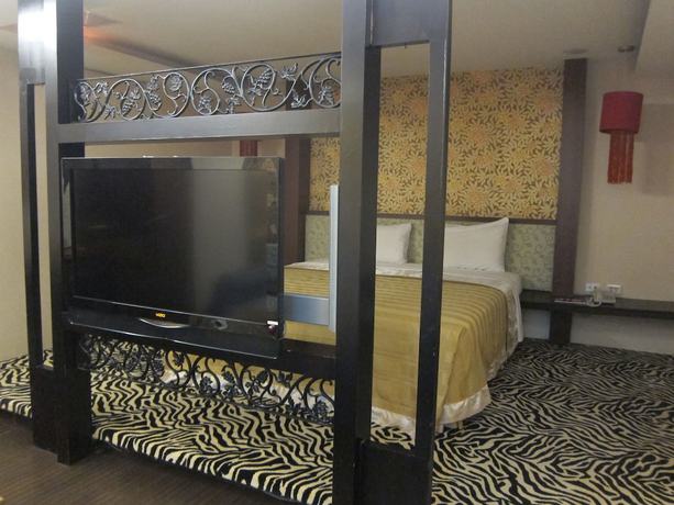 Imagen de la habitación del Hotel Tai Lee. Foto 12