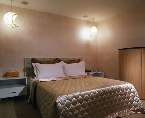 Imagen de la habitación del Hotel Tai Lee. Foto 13