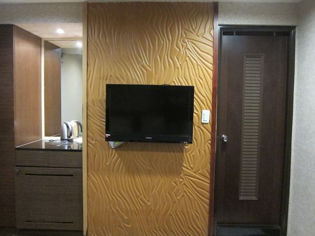Imagen de la habitación del Hotel Tai Lee. Foto 18
