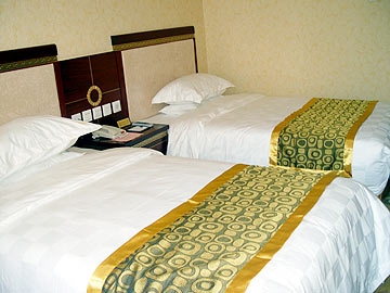 Imagen de la habitación del Hotel Tai Mu Shan International. Foto 4