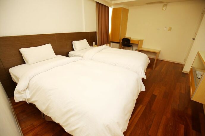 Imagen de la habitación del Hotel Tai Shinu. Foto 11