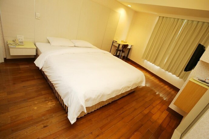 Imagen de la habitación del Hotel Tai Shinu. Foto 12