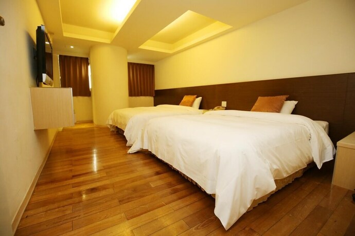 Imagen de la habitación del Hotel Tai Shinu. Foto 14
