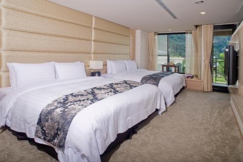 Imagen de la habitación del Hotel Tai Yi Red Maple Resort. Foto 7