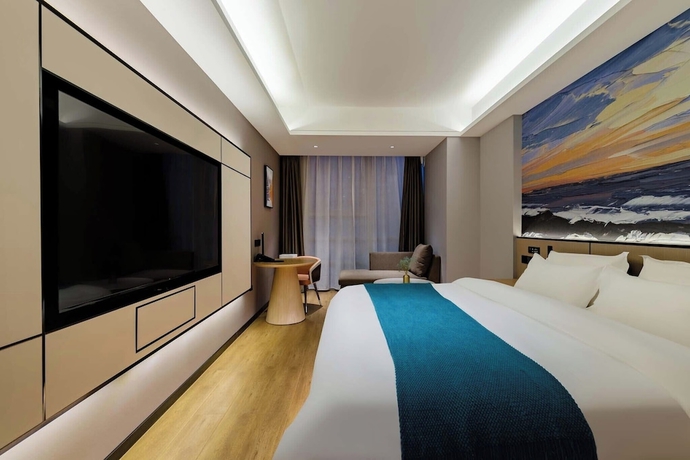 Imagen de la habitación del Hotel Taian Yuelan Wanda Plaza Taishan. Foto 2