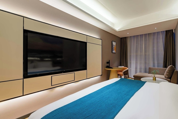Imagen de la habitación del Hotel Taian Yuelan Wanda Plaza Taishan. Foto 3