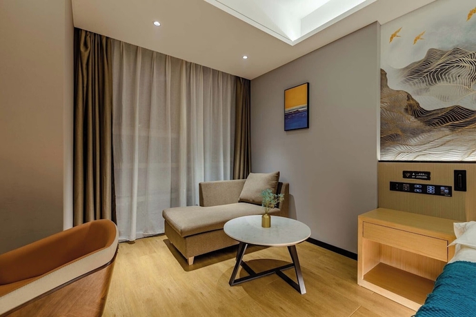 Imagen de la habitación del Hotel Taian Yuelan Wanda Plaza Taishan. Foto 7