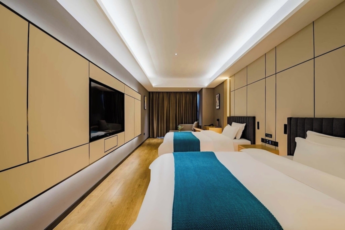 Imagen de la habitación del Hotel Taian Yuelan Wanda Plaza Taishan. Foto 8