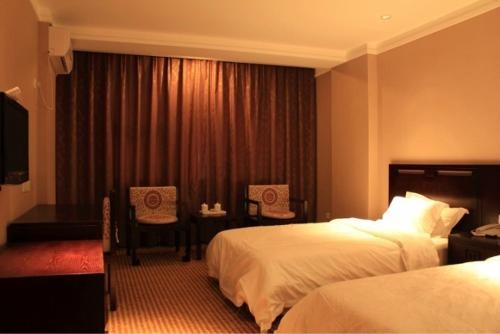 Imagen de la habitación del Hotel Taichi. Foto 6