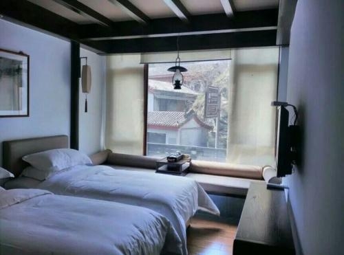 Imagen de la habitación del Hotel Taichi. Foto 7