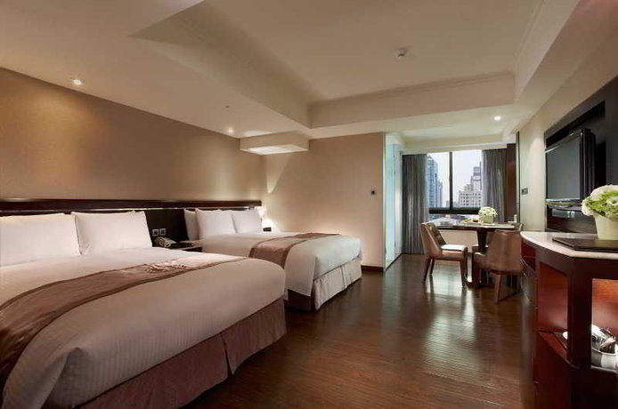 Imagen de la habitación del Hotel Taichung Charming City. Foto 2