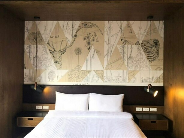 Imagen de la habitación del Hotel Taichung Easylazy Inn. Foto 17