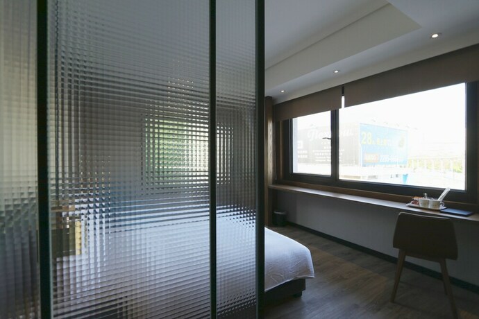 Imagen de la habitación del Hotel Taichung Easylazy Inn. Foto 18