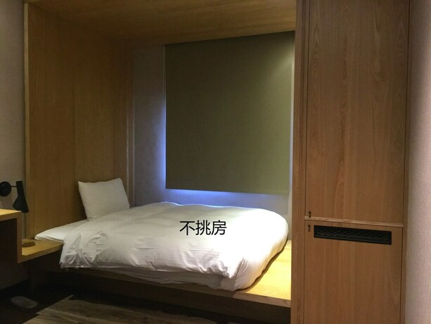 Imagen de la habitación del Hotel Taichung Easylazy Inn. Foto 30