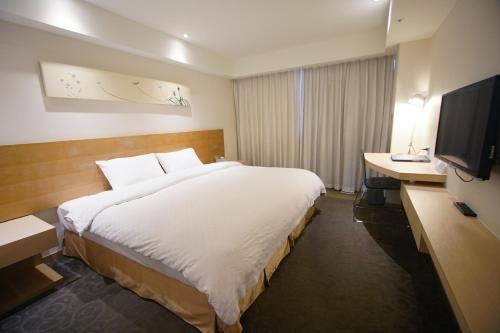 Imagen de la habitación del Hotel Taichung Feng Chia Beacon. Foto 7