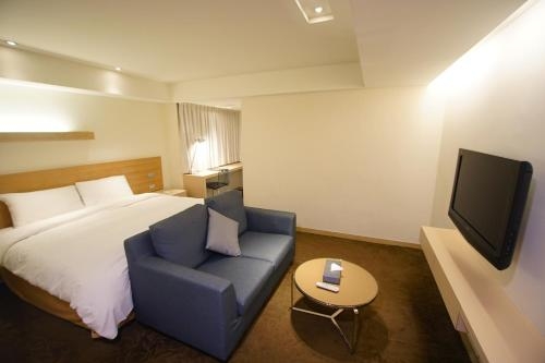 Imagen de la habitación del Hotel Taichung Feng Chia Beacon. Foto 9