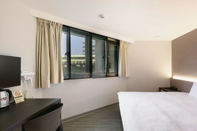 Imagen de la habitación del Hotel Taichung Kiwi Express. Foto 23