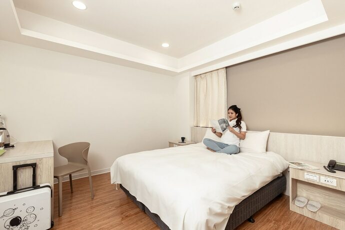 Imagen de la habitación del Hotel Taichung Kiwi Express. Foto 25