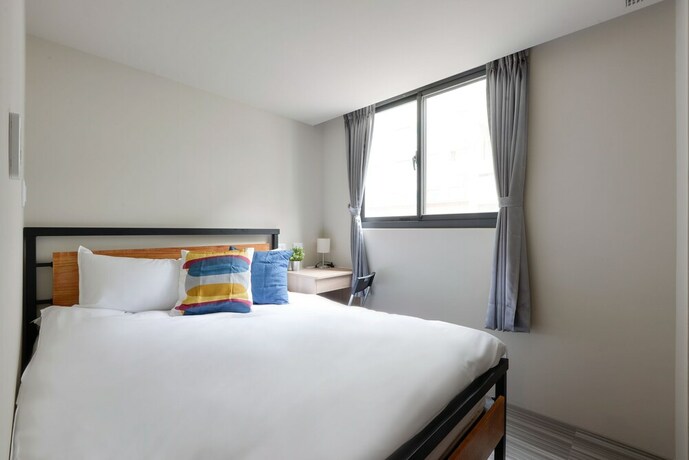 Imagen de la habitación del Hotel Taichung Walker. Foto 23