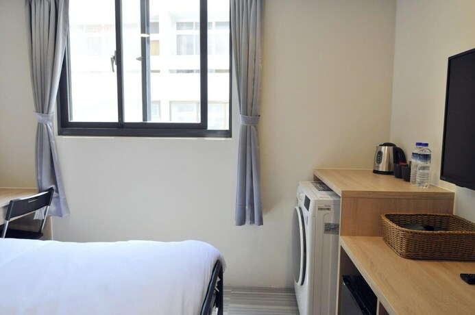 Imagen de la habitación del Hotel Taichung Walker. Foto 29