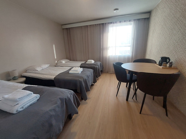 Imagen de la habitación del Hotel Taiga Resort. Foto 13