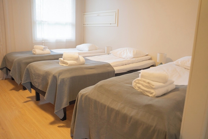 Imagen de la habitación del Hotel Taiga Resort. Foto 15
