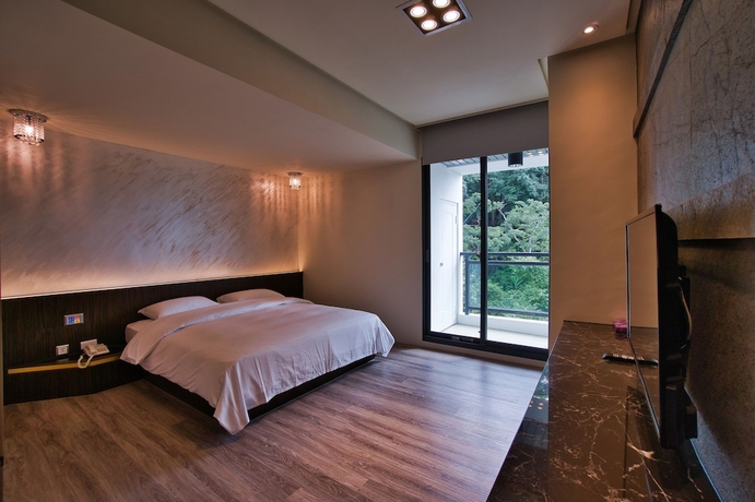 Imagen de la habitación del Hotel Taihe. Foto 9