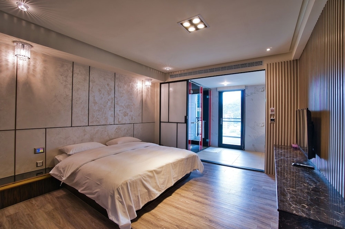 Imagen de la habitación del Hotel Taihe. Foto 10