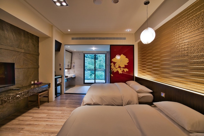 Imagen de la habitación del Hotel Taihe. Foto 12