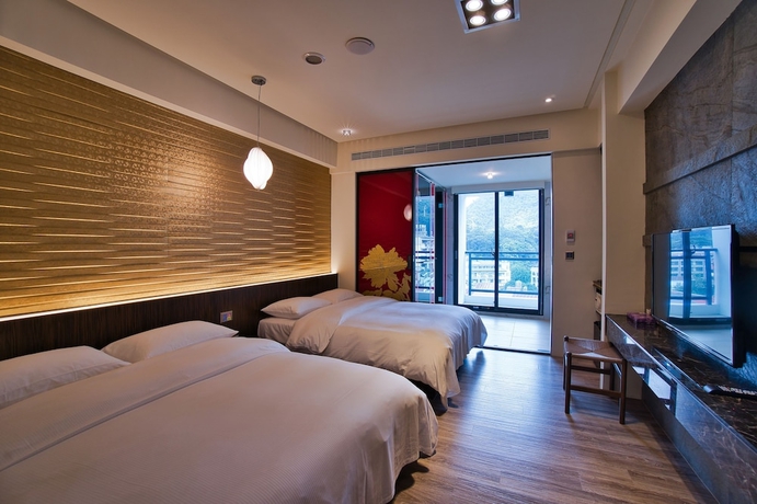 Imagen de la habitación del Hotel Taihe. Foto 13