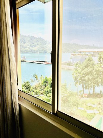 Imagen de la habitación del Hotel Taihu Sun Moon Lake. Foto 13