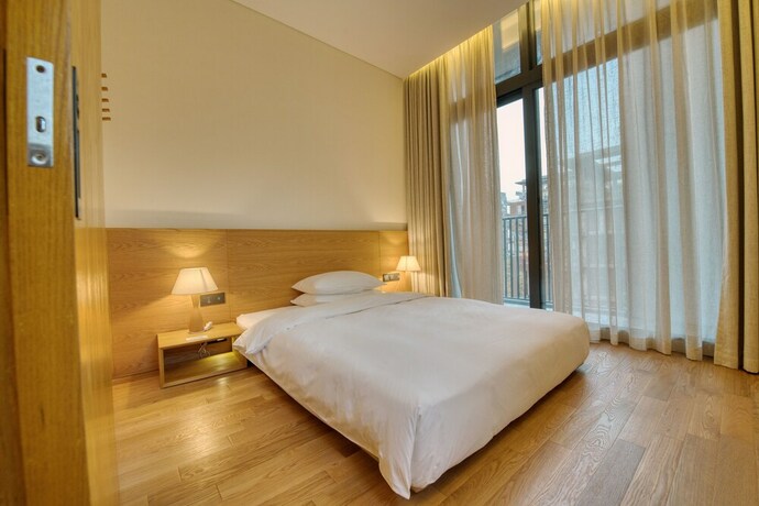 Imagen de la habitación del Hotel Taihua Wutong, Shenzhen. Foto 19