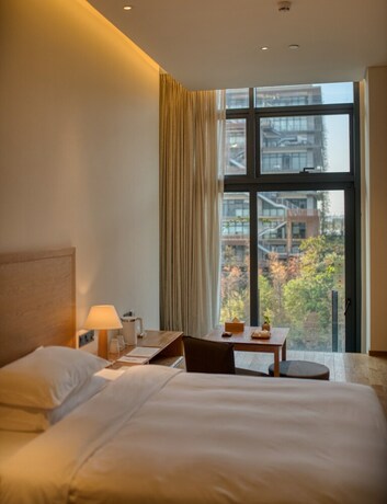 Imagen de la habitación del Hotel Taihua Wutong, Shenzhen. Foto 20