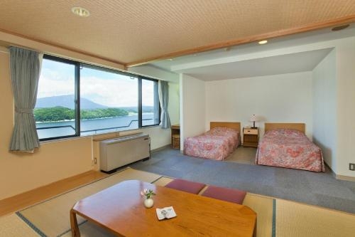 Imagen de la habitación del Hotel Taikan. Foto 7