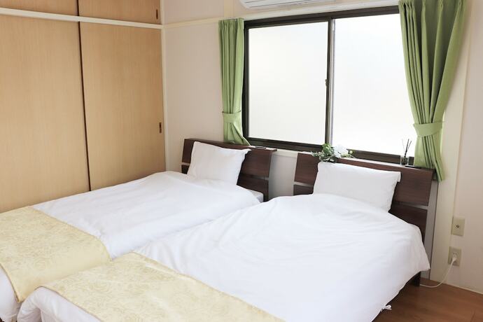 Imagen de la habitación del Hotel Taiko 2chome House. Foto 31