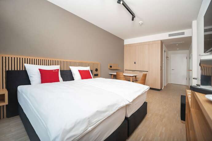 Imagen de la habitación del Hotel Tailormade BAB Bachenbülach. Foto 17