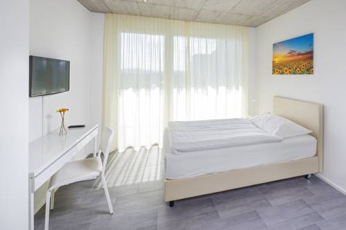 Imagen de la habitación del Hotel Tailormade Idea Spreitenbach. Foto 9