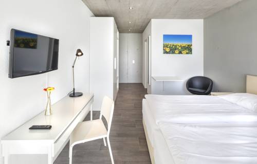 Imagen de la habitación del Hotel Tailormade Idea Spreitenbach. Foto 13