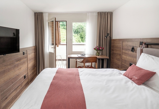 Imagen de la habitación del Hotel Tailormade KRONE Sarnen. Foto 2