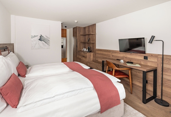 Imagen de la habitación del Hotel Tailormade KRONE Sarnen. Foto 4