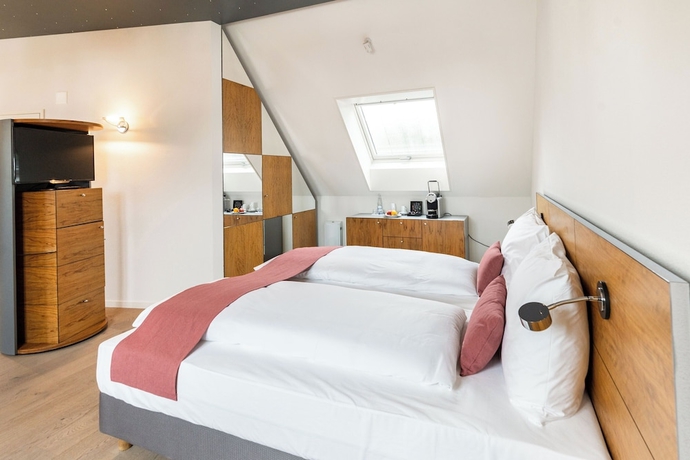 Imagen de la habitación del Hotel Tailormade KRONE Sarnen. Foto 5