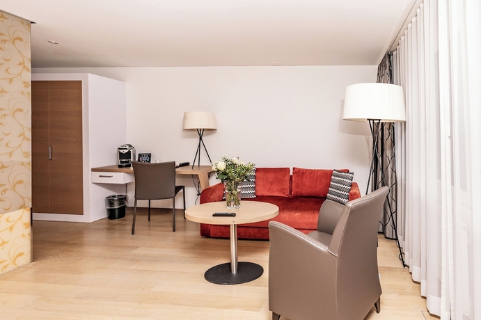 Imagen de la habitación del Hotel Tailormade KRONE Sarnen. Foto 6