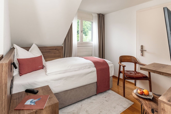 Imagen de la habitación del Hotel Tailormade KRONE Sarnen. Foto 7