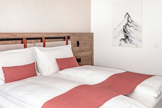 Imagen de la habitación del Hotel Tailormade KRONE Sarnen. Foto 12