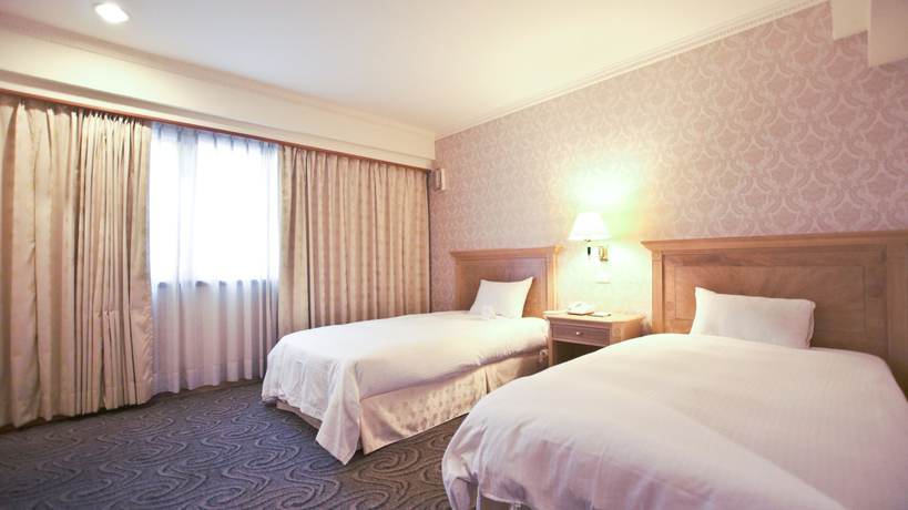 Imagen de la habitación del Hotel Tainan Cambridge. Foto 11