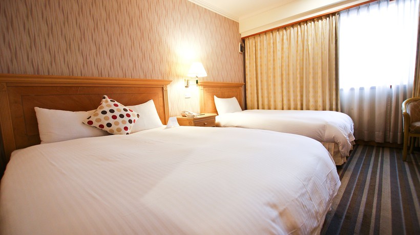 Imagen de la habitación del Hotel Tainan Cambridge. Foto 13